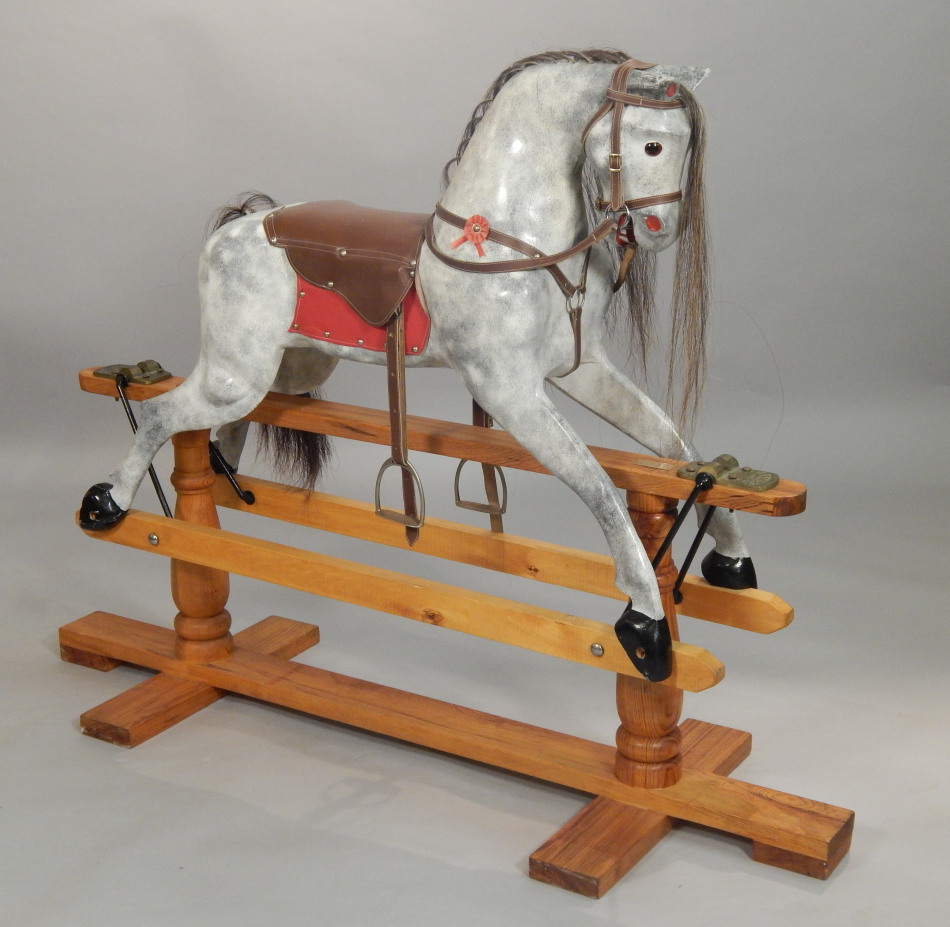 Appraisal: A modern dapple grey rocking horse made by Tom Cobley