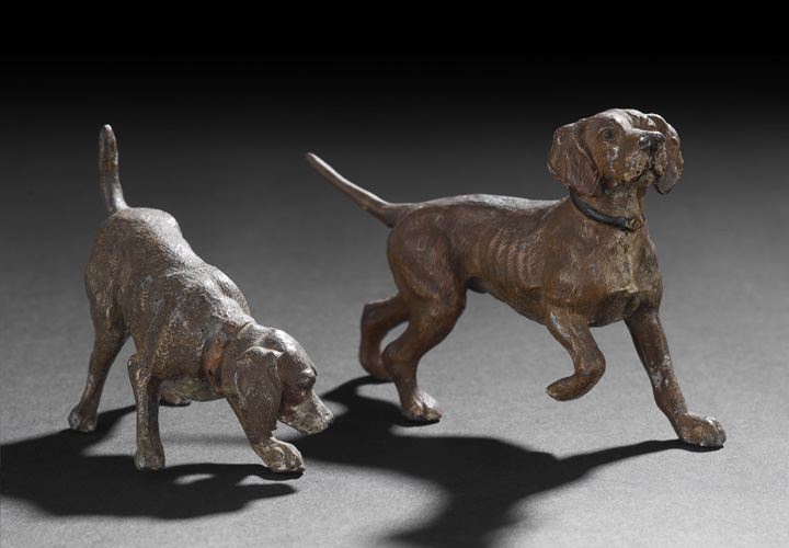 Appraisal: Two German Cold-Painted Cast-Spelter Figures of Bird Dogs first quarter