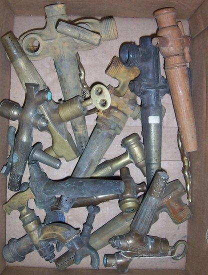 Appraisal: A quantity of brass beer taps bottle openers etc