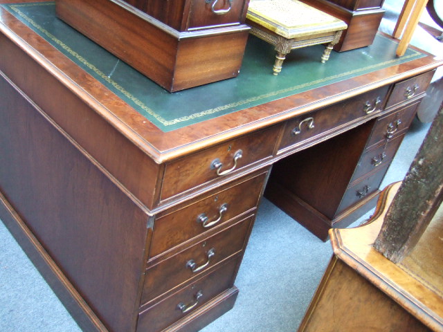 Appraisal: An oak and burr walnut twin pedestal desk the inset