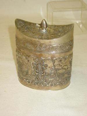 Appraisal: A DUTCH TEA CADDY of oval form the bud finial