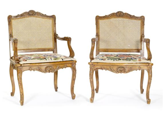 Appraisal: A PAIR OF ARMCHAIRS R gence style th c molded