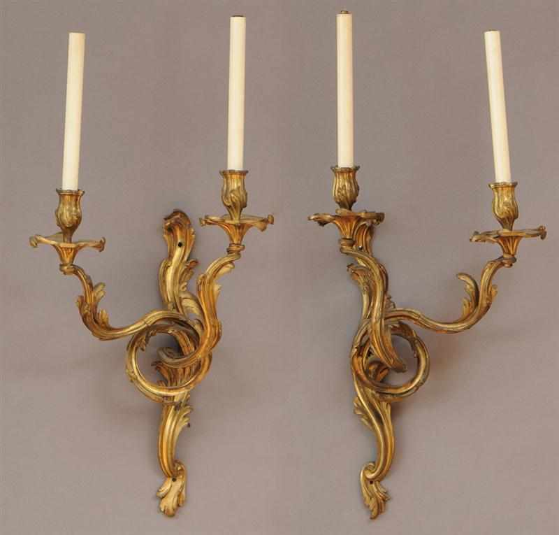 Appraisal: PAIR OF LOUIS XV STYLE GILT-BRONZE TWO-LIGHT WALL APPLIQUES Each