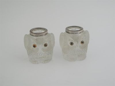 Appraisal: A pair of Edwardian vesta holders in the form of