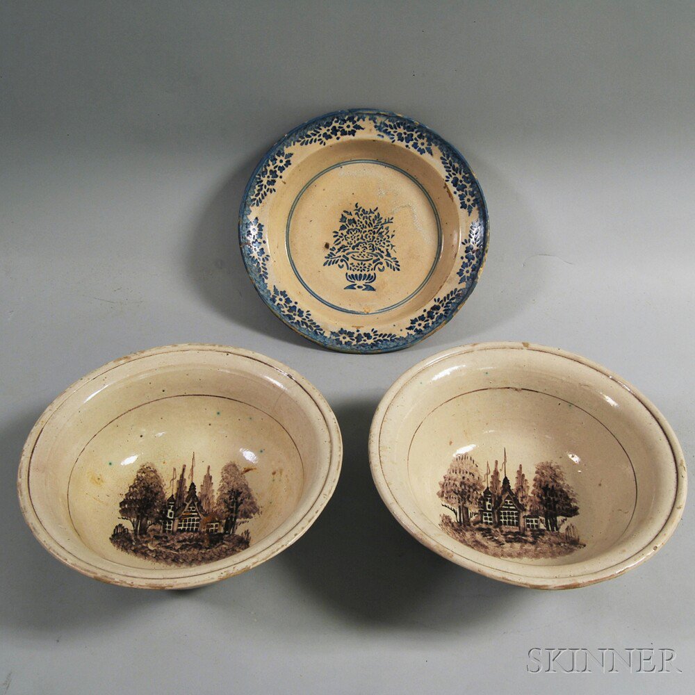 Appraisal: Three Tin-glazed Earthenware Bowls a pair of large bowls with