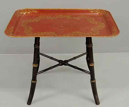 Appraisal: Red Tole decorated tray table with bamboo form legs h