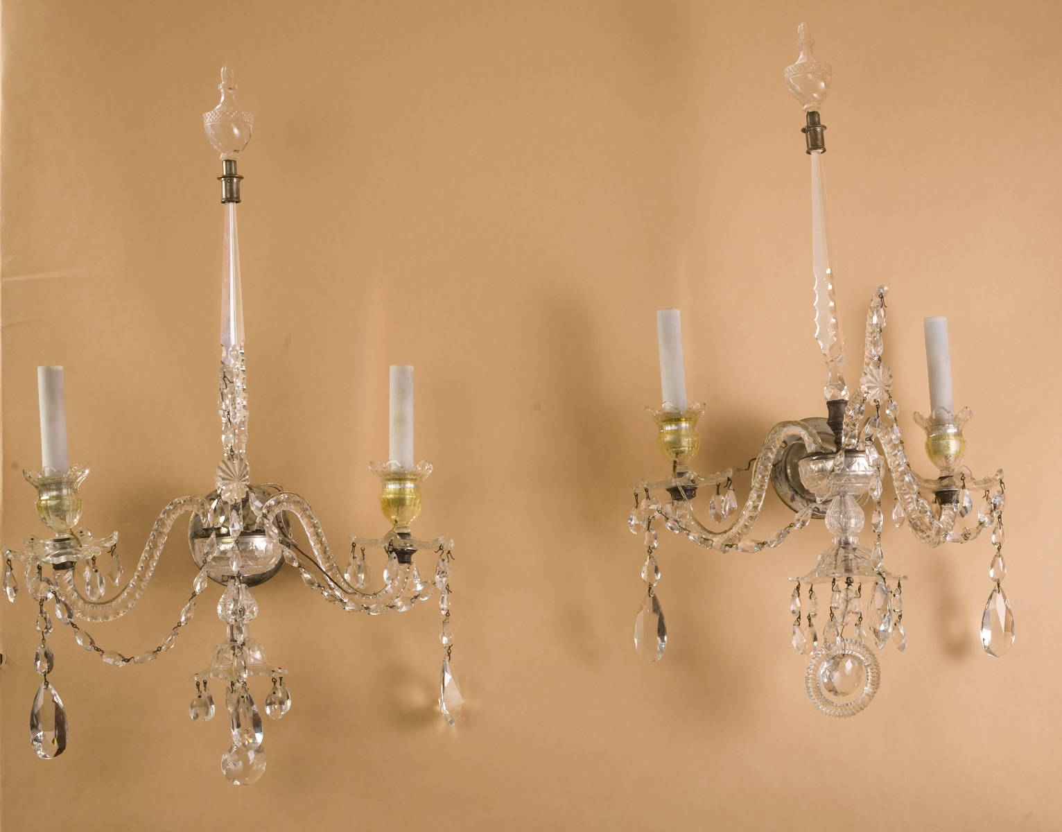 Appraisal: PAIR OF ANGLO-IRISH GEORGIAN STYLE TWO-LIGHT CANDELABRA HUNG WITH DROPS