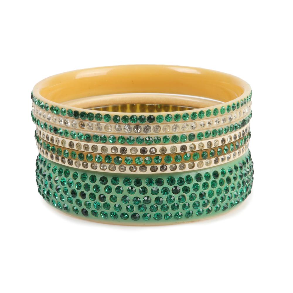 Appraisal: THREE GREEN ON CREAM CELLULOID SPARKLER BANGLE BRACELETS INNER DIAM