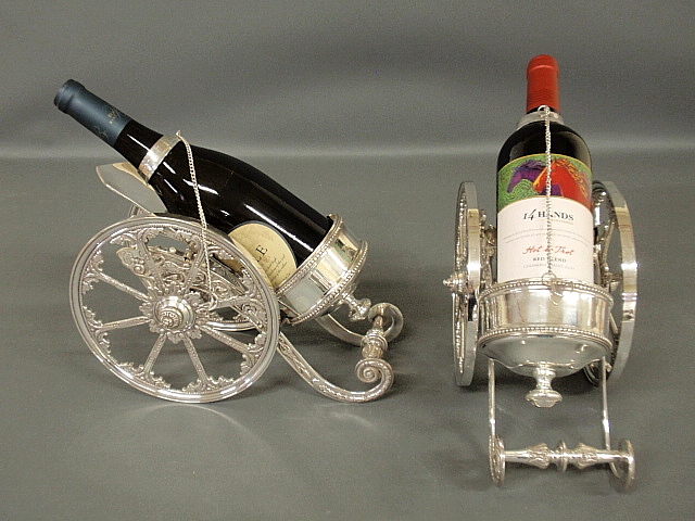 Appraisal: - Pair of Sheffield style silverplate cannon-form wine trolleys h