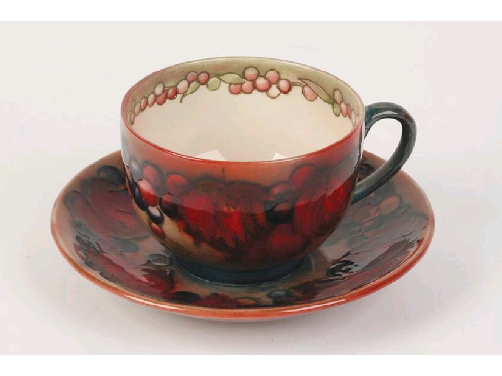 Appraisal: A CUP AND SAUCER decorated in the Leaf and Berry