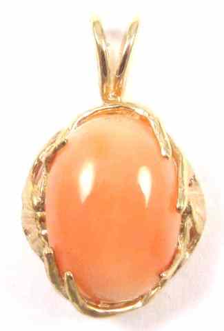 Appraisal: PINK CORAL AND YELLOW GOLD PENDANT k gold set with