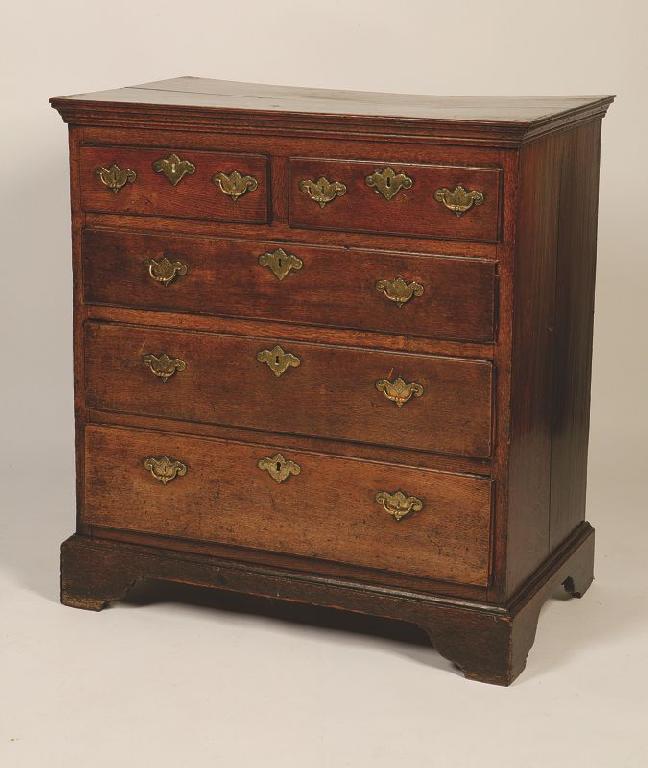 Appraisal: A GEORGE II OAK CHEST OF DRAWERS the rectangular top