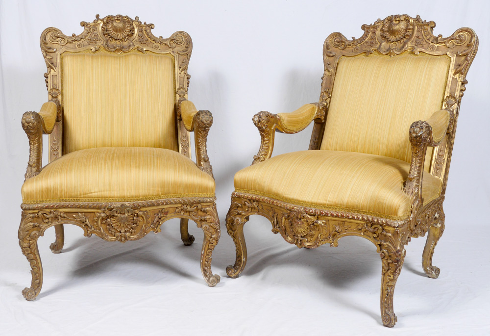 Appraisal: PAIR CARVED GOLD GILT CHAIRS Frames profusely carved all over