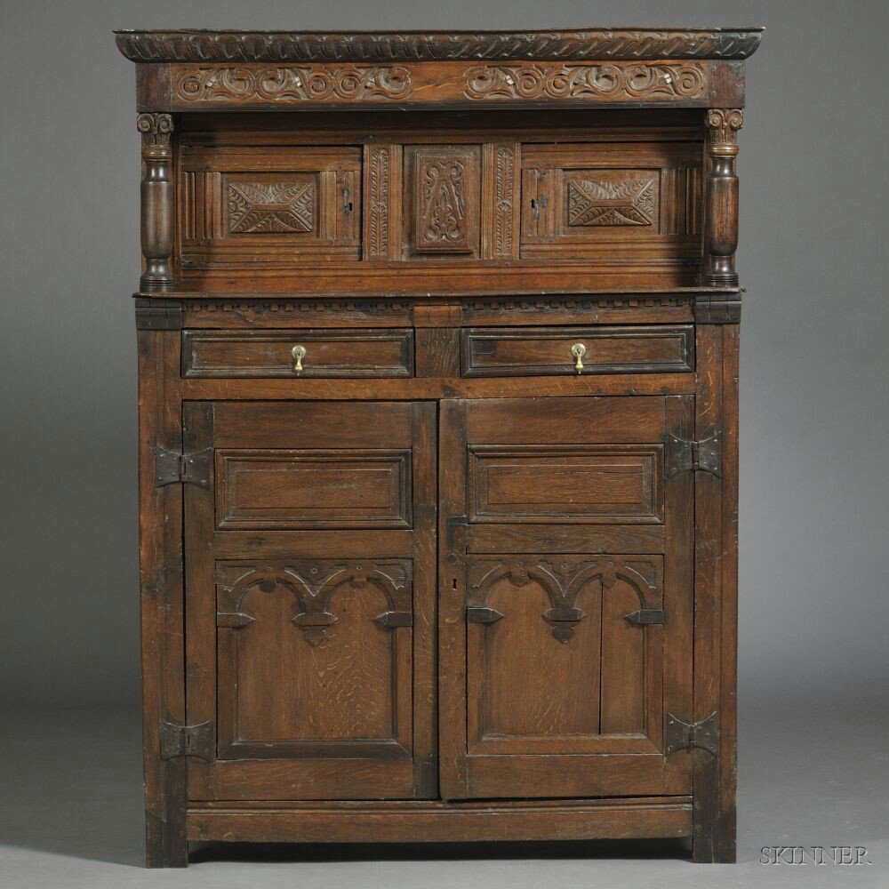 Appraisal: Jacobean-style Oak Court Cupboard with period elements overhanging hood above