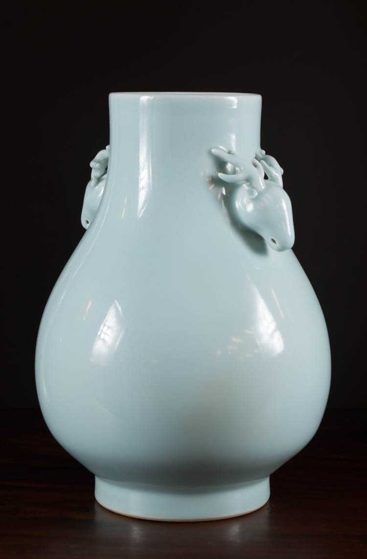 Appraisal: CHINESE QING PORCELAIN VASE hu form with tapered foot and