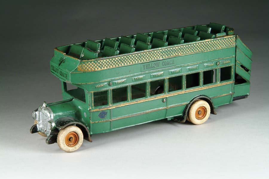 Appraisal: ARCADE YELLOW COACH BUS A true to scale toy of