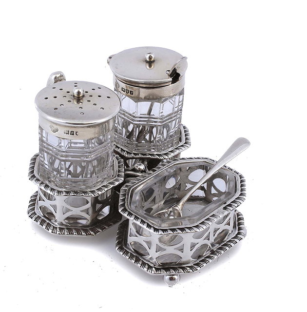 Appraisal: A SILVER THREE PIECE CRUET SET with pepper pot mustard