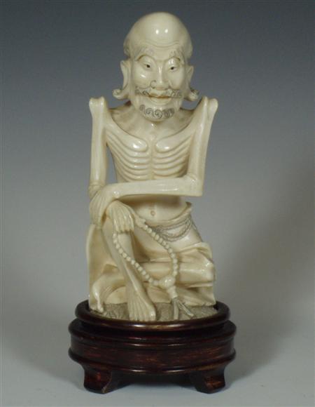 Appraisal: An early th century Japanese figure of a skinny man