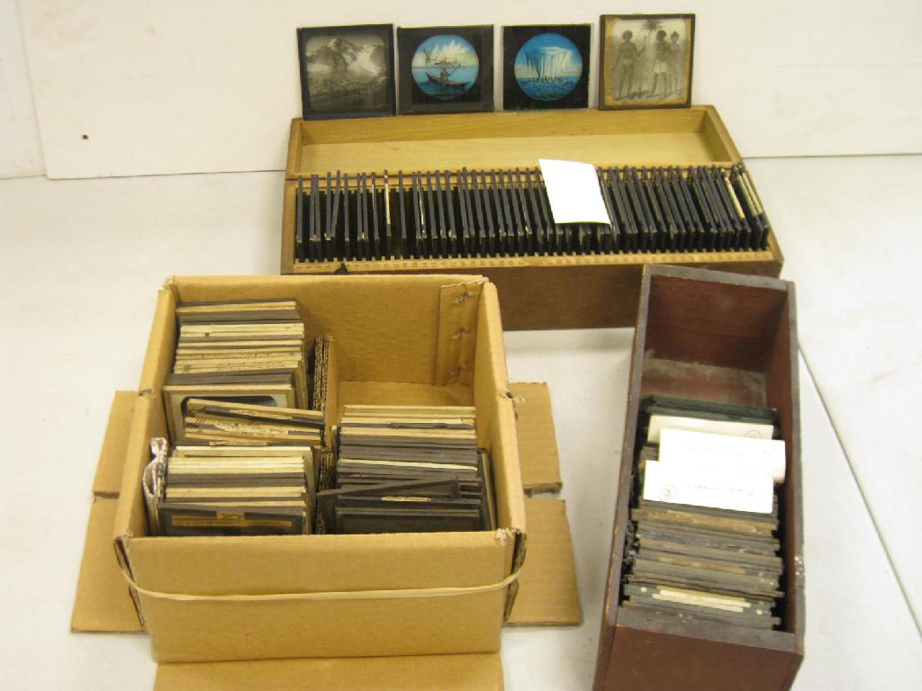 Appraisal: Three boxes of Lantern Slides including Icebergs Alps African Figures