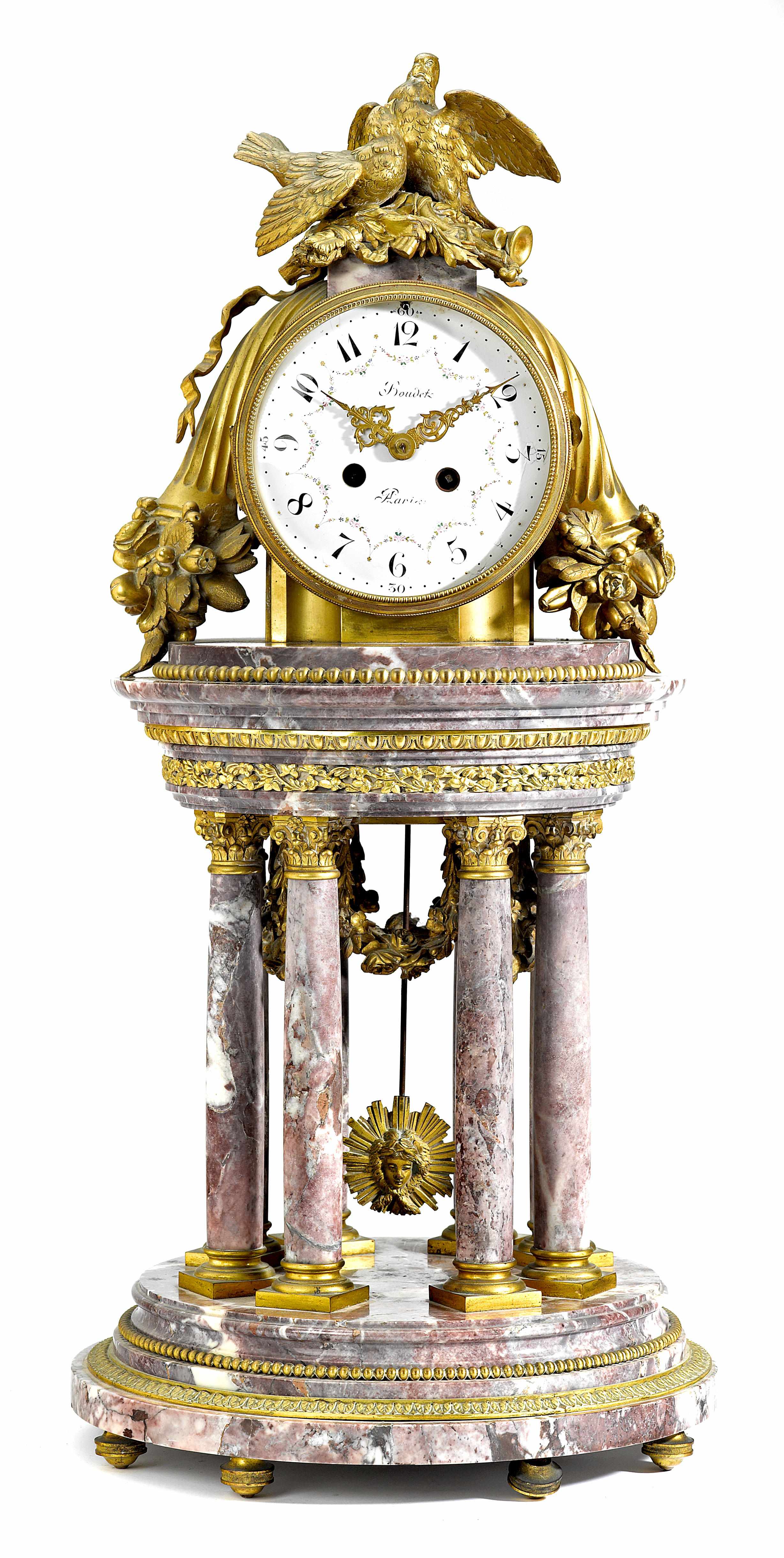 Appraisal: A Louis XVI style gilt bronze mounted marble mantel clock