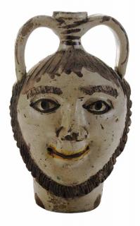 Appraisal: Ceramic Bearded Face Jug probably Italian mid- th century glazed