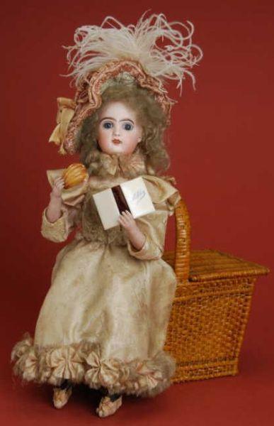 Appraisal: Lambert Child Seated on Picnic Basket Automaton France ca unmarked