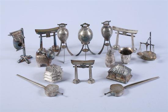 Appraisal: JAPANESE STERLING SILVER SALT AND PEPPER SHAKERS Including shrine arches