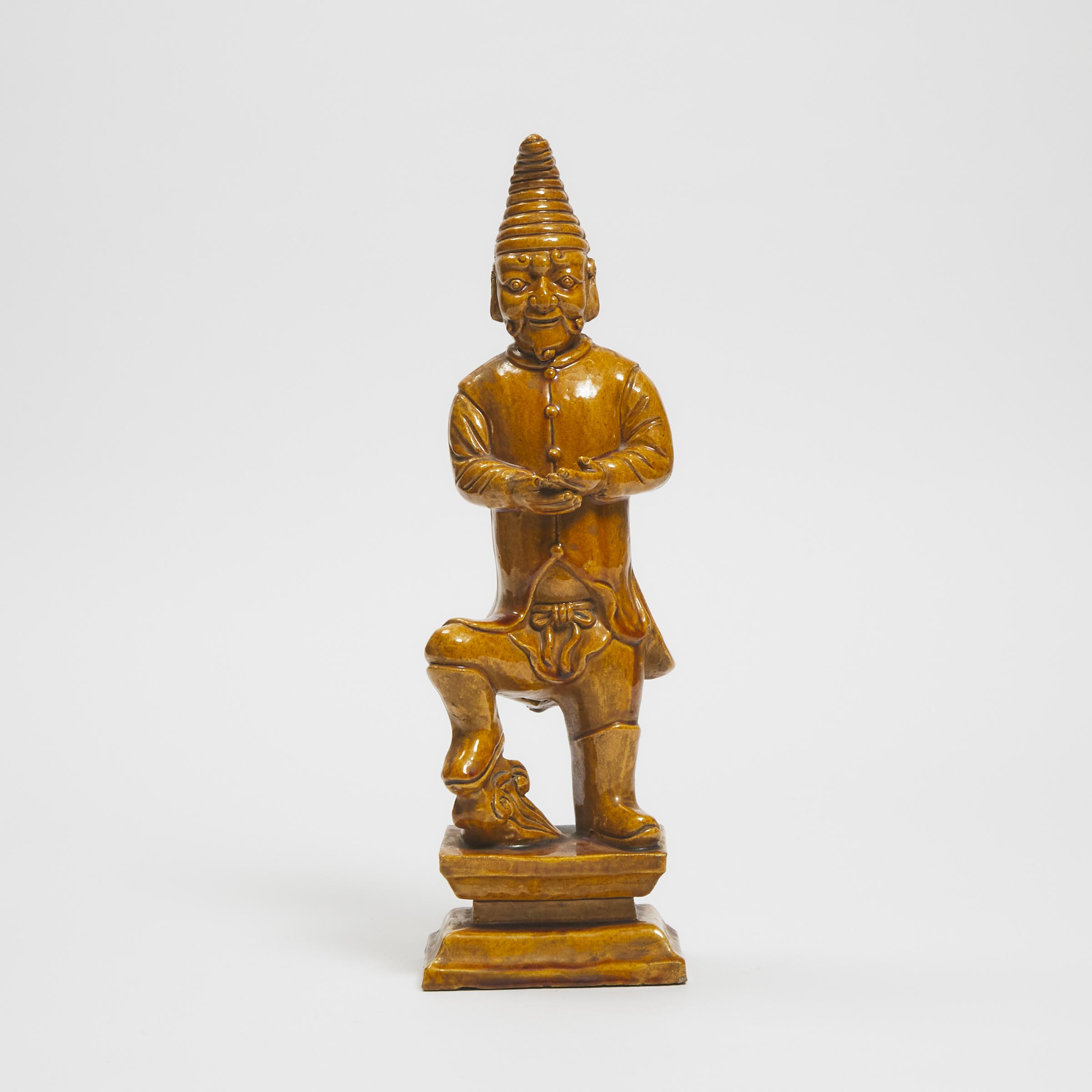 Appraisal: A Straw-Glazed Figure of a Foreigner Ming Dynasty - with