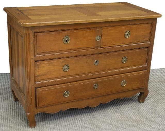 Appraisal: French Provincial Louis XV style fruitwood commode th c fitted