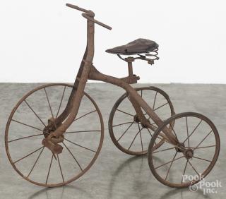 Appraisal: Primitive iron child's bicycle th c '' h Provenance Barbara