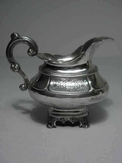 Appraisal: th century Dutch silver creamer jug Modified neo-classical design with