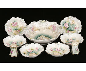 Appraisal: Porcelain berry bowl set with floral and gilt decoration Lot