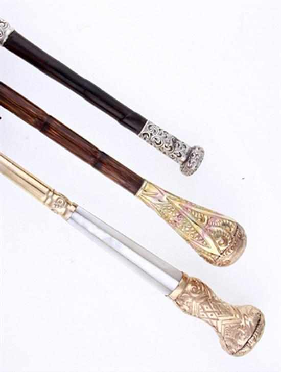 Appraisal: Victorian silver and gold parasol handles th century comprising English