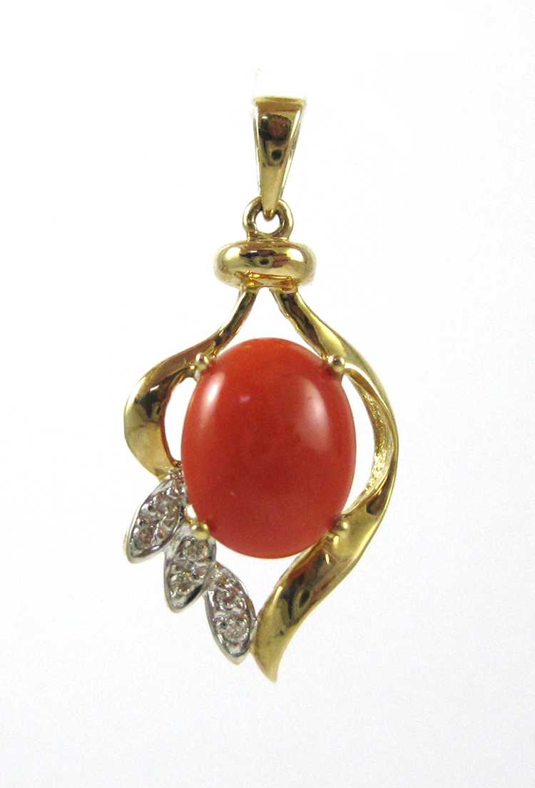 Appraisal: CORAL DIAMOND AND YELLOW GOLD PENDANT The k gold pendant