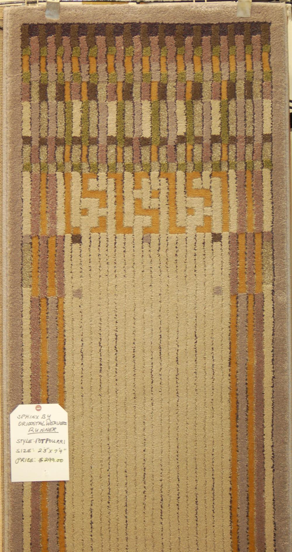 Appraisal: CONTEMPORARY RUNNER having a beige field with accents in brown