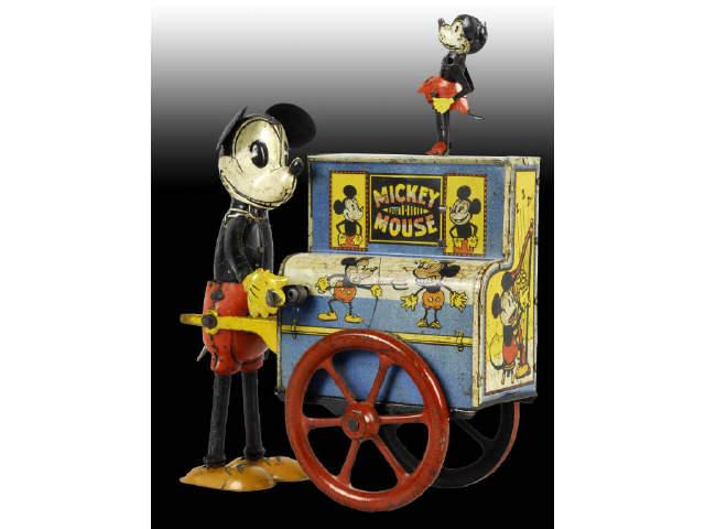 Appraisal: German Distler Walt Disney Mickey Minnie Toy Description Organ Grinder