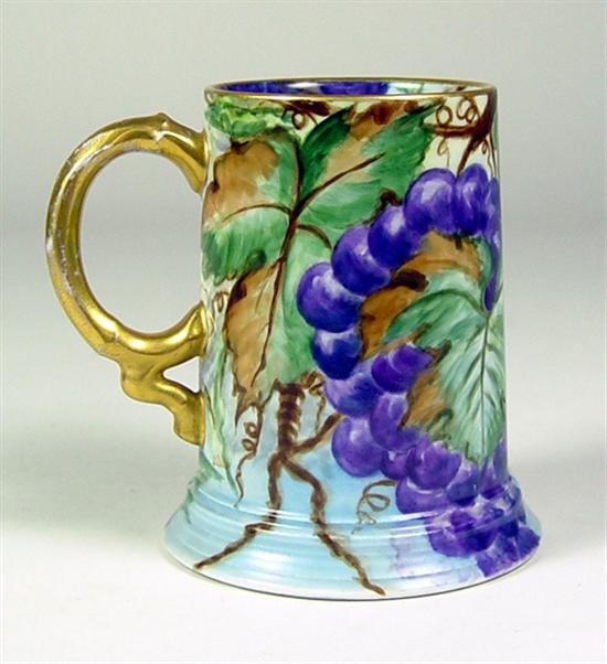 Appraisal: Limoges Tankard All over grape design Green leaf design with