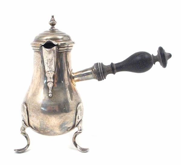 Appraisal: A Swiss silver tripod pot with wooden side handleMaker's mark