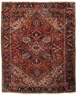 Appraisal: Heriz rug typical patterns on brick red and ivory field