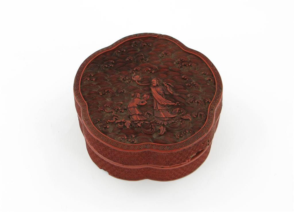 Appraisal: A Chinese red cinnabar lacquer lobed box and cover