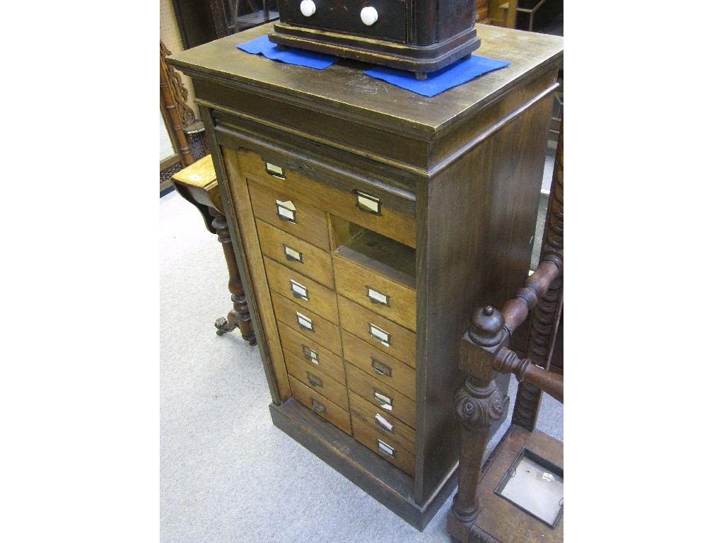 Appraisal: Oak louvre door filing chest one drawer missing