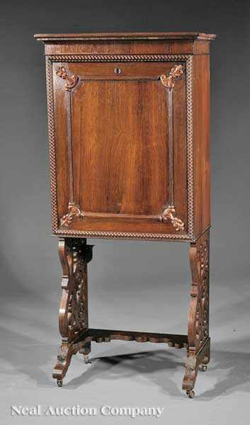 Appraisal: An American Rococo Carved Rosewood Desk mid- th c case