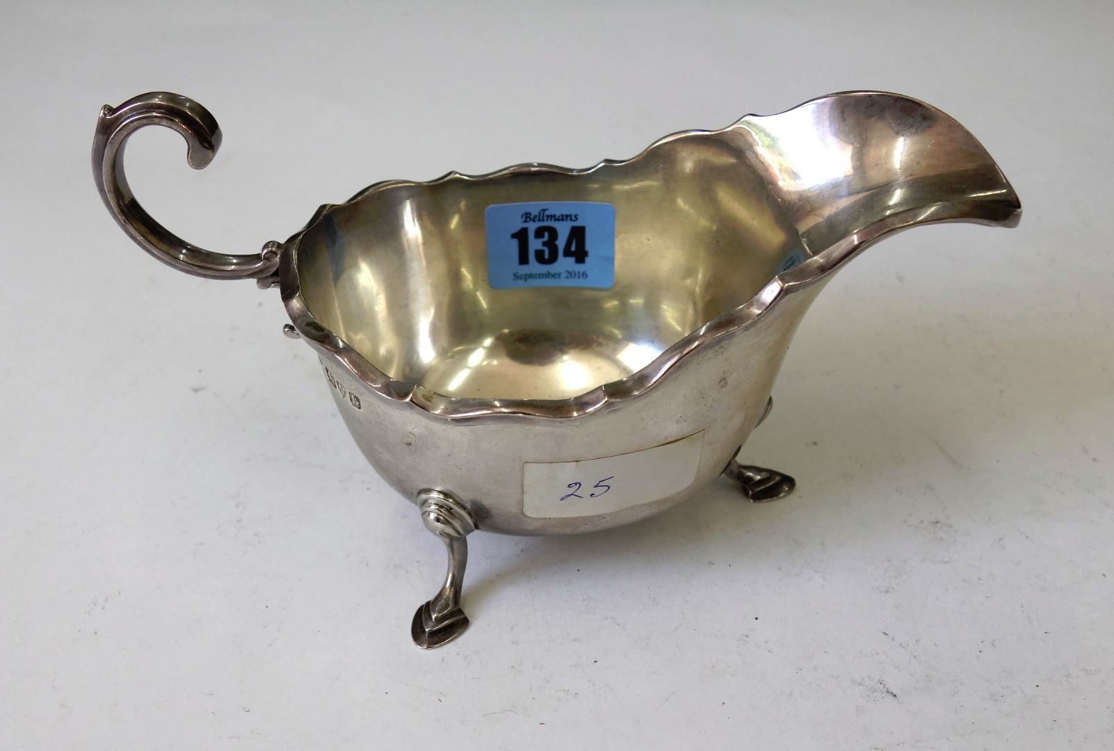 Appraisal: A George II style silver helmet sauce boat Adie Brothers