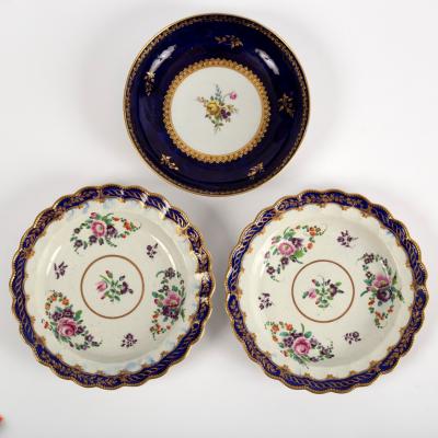 Appraisal: A pair of Worcester lobed plates painted flower garlands within