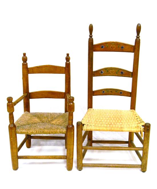 Appraisal: Two children-sized wooden chairs ladderback with rush seat minor wear