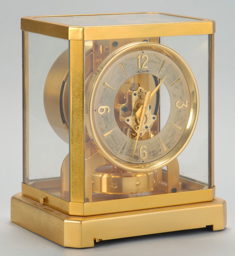 Appraisal: LE COULTRE ATMOS CLOCK In brass with glass case Height