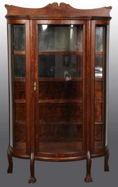 Appraisal: Oak Bow Front China Cabinet Description With mirrored back and