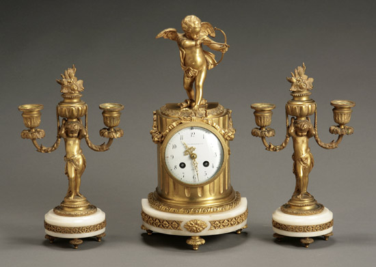 Appraisal: French Ormolu Mounted Marble Three-Piece Clock Garniture Retailed by Bigelow