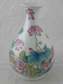 Appraisal: A Chinese ceramic vase with overglaze bright enamel flora pictograms