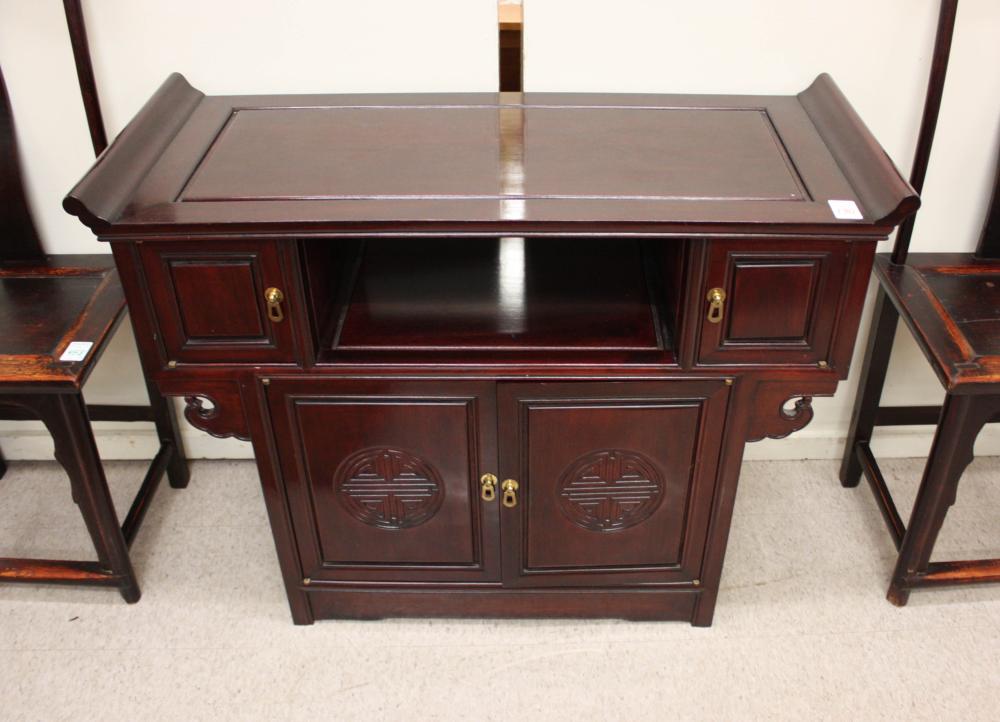 Appraisal: ROSEWOOD CABINET ALTAR TABLE Chinese import late th century H